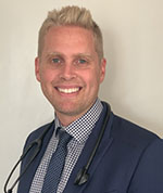 Photograph of Heath Adams.