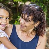 Australian Aboriginal Woman Hugging Her Granddaughter