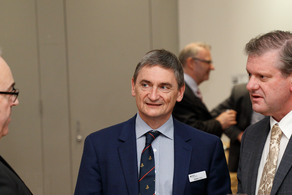 Picture of interim CEO Duane Findlay at Board event