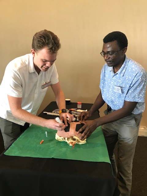 Dr Sunday Pam meets Dr Callum Weeks (an old student of UQ Rural Clinical School Rockhampton) at APLS course July 2018. 