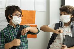 Kids in masks at school - GettyImages-1255068508 (2)