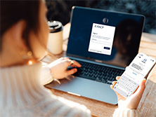Woman using phone for MFA to login