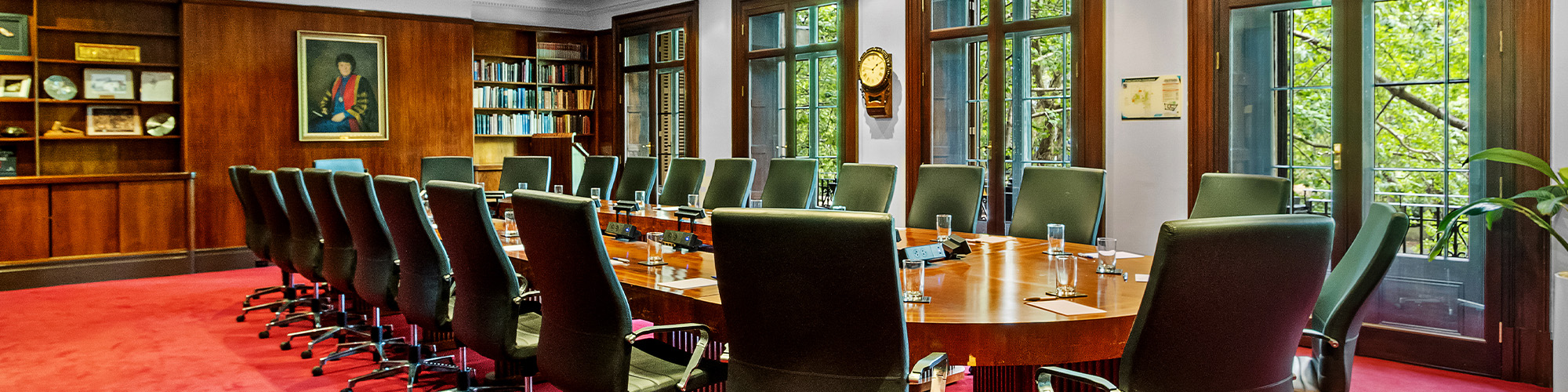 meeting room with a large table, chairs.
