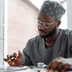 Male doctor sitting at desk working