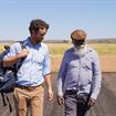 aboriginal man and white male physician on a tarmac